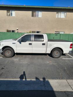2005 IM IN HB $2500 OBO Ford f150 MILLAS 222098 lariat las placas expiraron enero de Este año ocupa una llanta titulo limpio LA PUEDO MOSTRAR DESPUES