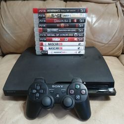 Playstation 3 PS3 with one controller plus 10 games read description