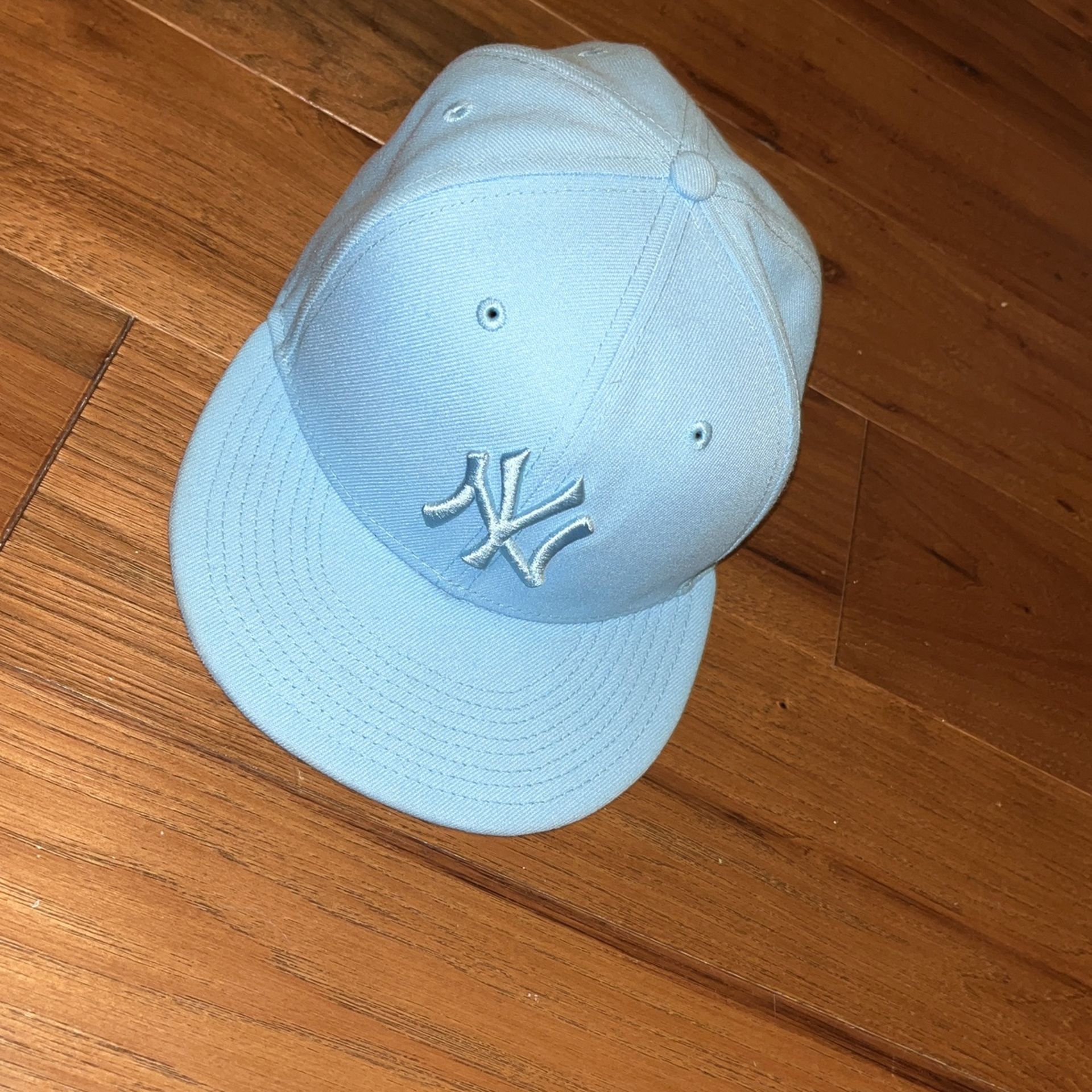 light blue New York Yankees hat