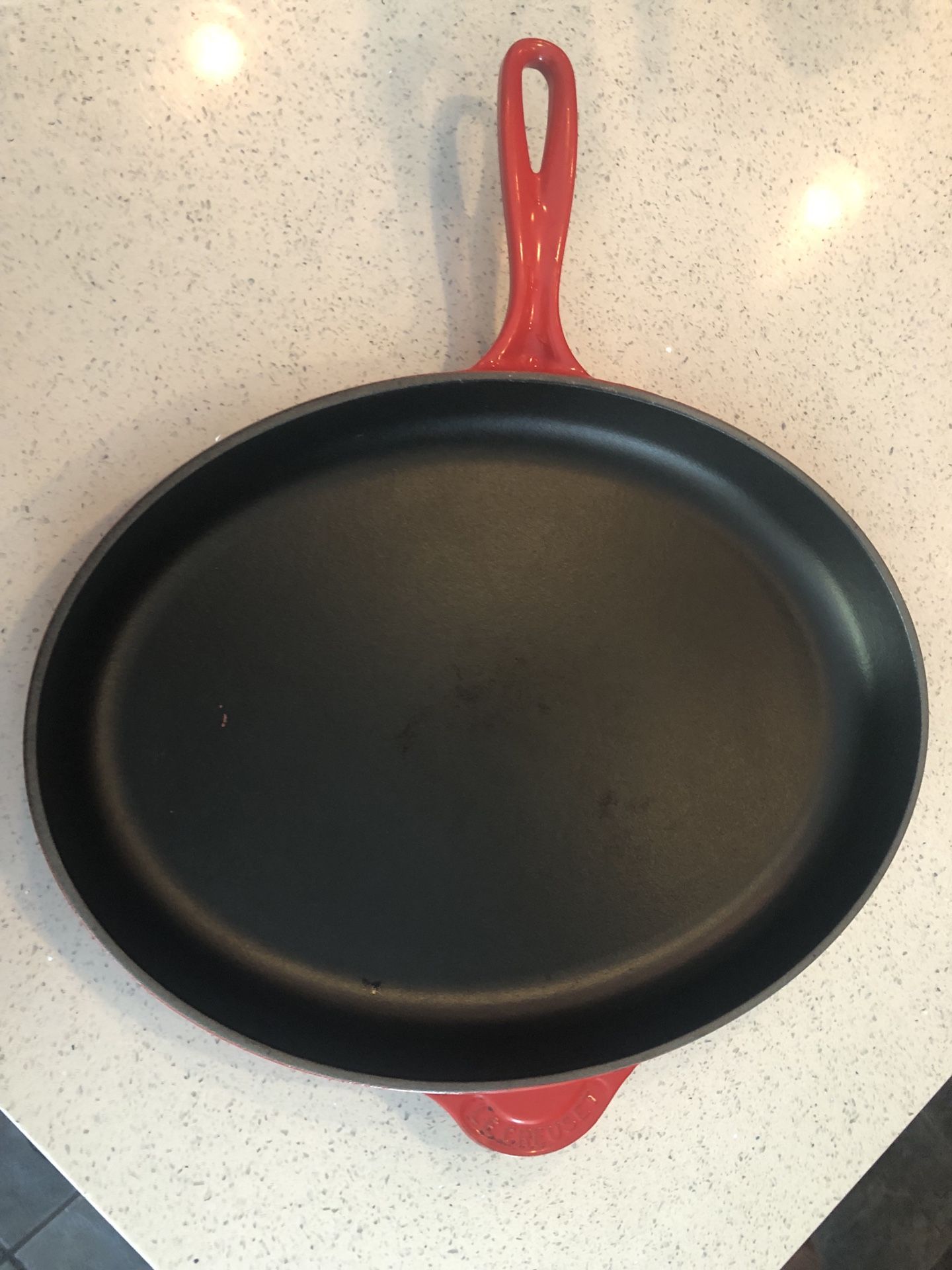 Le Creuset 15.75" Cast Iron Oval Skillet Red