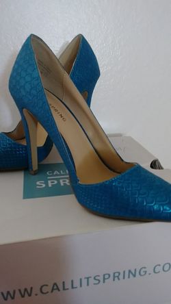 Teal pumps.