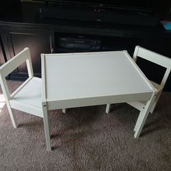 Child's table, 2 chairs.
