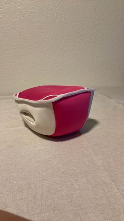 Laptop lap pad with cell phone pouch.