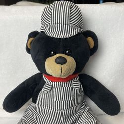Plush black teddy bear Charlie Dressed As A train conductor