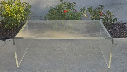 Heavy lucite coffee table