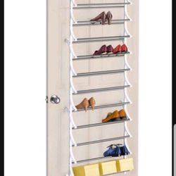 Shoe Rack. Over the door shoe rack, complete set. Gently Used. Holds Over 14 pairs of Shoes.
