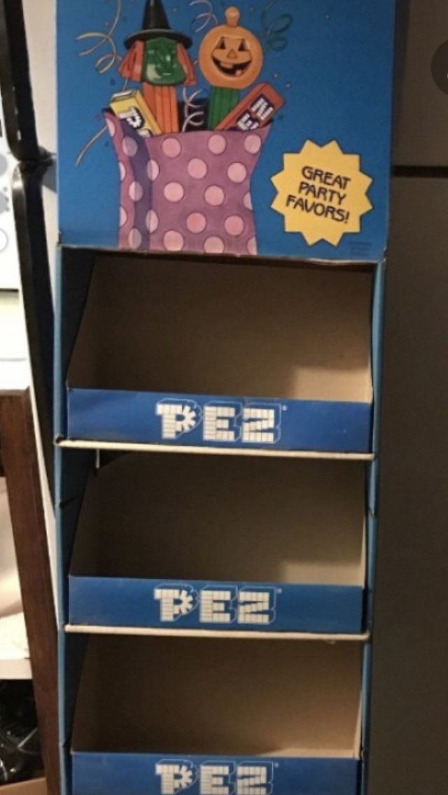 Pez display stand with header card. Many to choose from $10 each.