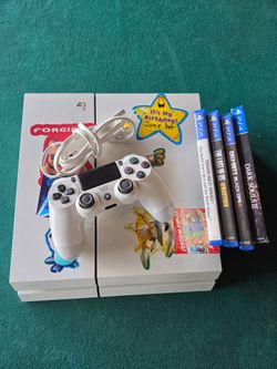 White PS4 Console with Controller and 4 Games