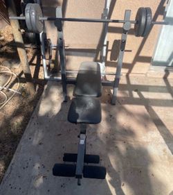 Weight bench with bar and weights