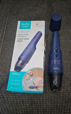 Compact Rechargeable vacuum with attachment