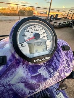 Polaris ATV with Purple Camo Wrap