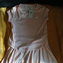 Brand new 2 piece New Balance skirt set for girls. Size 6x (Cash only)