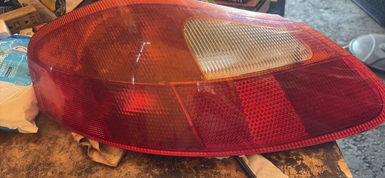 a left -hand tail light assembly for a 1(contact info removed) Porsche Boxster (986)