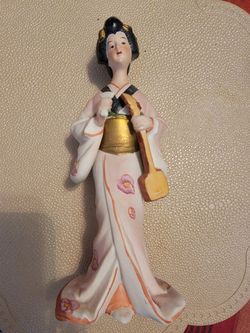 Vintage Geisha figurine in kimono