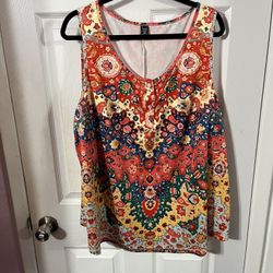Women’s Size 5X (looks like it runs small more like a 3X) Tunic Length sleeveless top.  Brand new never wore. 