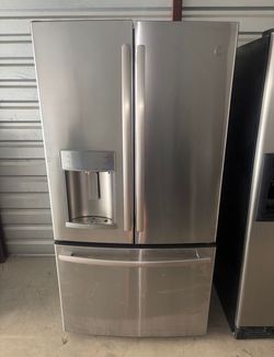 GE Stainless Steel Refrigerator And Freezer