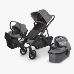 Uppababy Vista Stroller (sierra dune knit color) with a Toddler Seat, Bassinet, Car Seat and Travel Bag. 