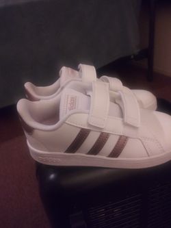 Rose gold Adidas size 10 for kids