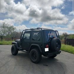 Jeep Wrangler TJ With Roof Rack Tires