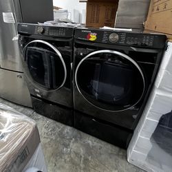 BLACK WASHER AND GAS DRYER