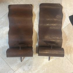 2 brown candle holders 