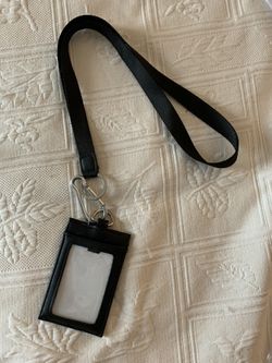 Black lanyard area in back for ID, credit card