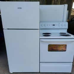 LIKE NEW REFRIGERATOR AND ELECTRIC STOVE,  FREE DELIVERY AND INSTALLATION, 30 DAYS WARRANTY 