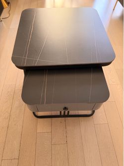 Modern black marble-inspired lift-top coffee