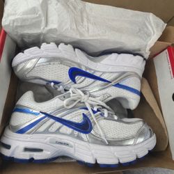 White and Silver Sneakers with Blue Accents