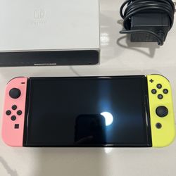 OLED Nintendo Switch Console with Pink and Yellow Controllers, Dock and Accessories