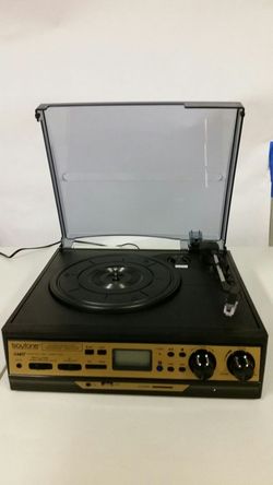 Turn table vinyl, cassette, mp3, am/fm, BT