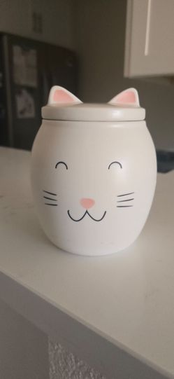 *Free*Cute cat-themed storage container with lid.