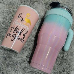 Zenbo 40 oz Glitter Pastel Gradient Tumbler alongside a generic pink flamingo acrylic tumbler