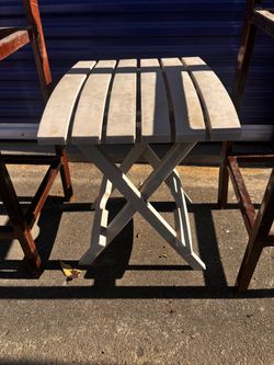 Sturdy plastic or vinyl fold out table