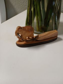 Vintage Mini hand carved figurine elephant pulling log