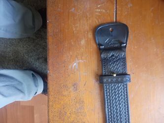 Badge belt and cooked with keys all together and one