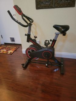 Indoor Spinner Exercise Bike • Adjustable • Smooth & Quiet Ride
