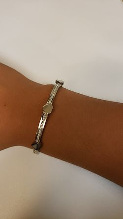 Silver colored steerling steel hard bracelet