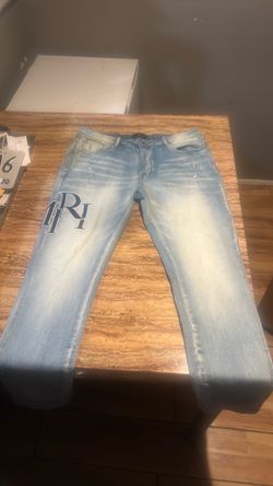 Purple and Amiri Jeans
