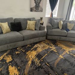 grey couches (2 piece)