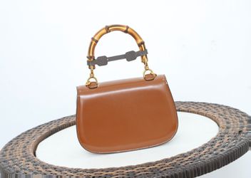Gucci Bamboo 1947 small top handle bag in orange leather