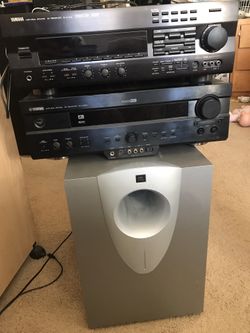 Two YAMAHA RECEIVERS AND A DIGITAL 12 inches SUBWOOFER 600 WATTS.