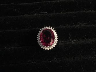 Garnet and white topaz ring