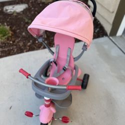 Radio Flyer 4-in-1 Stroll ‘N Trike Tricycle Stroller Pink