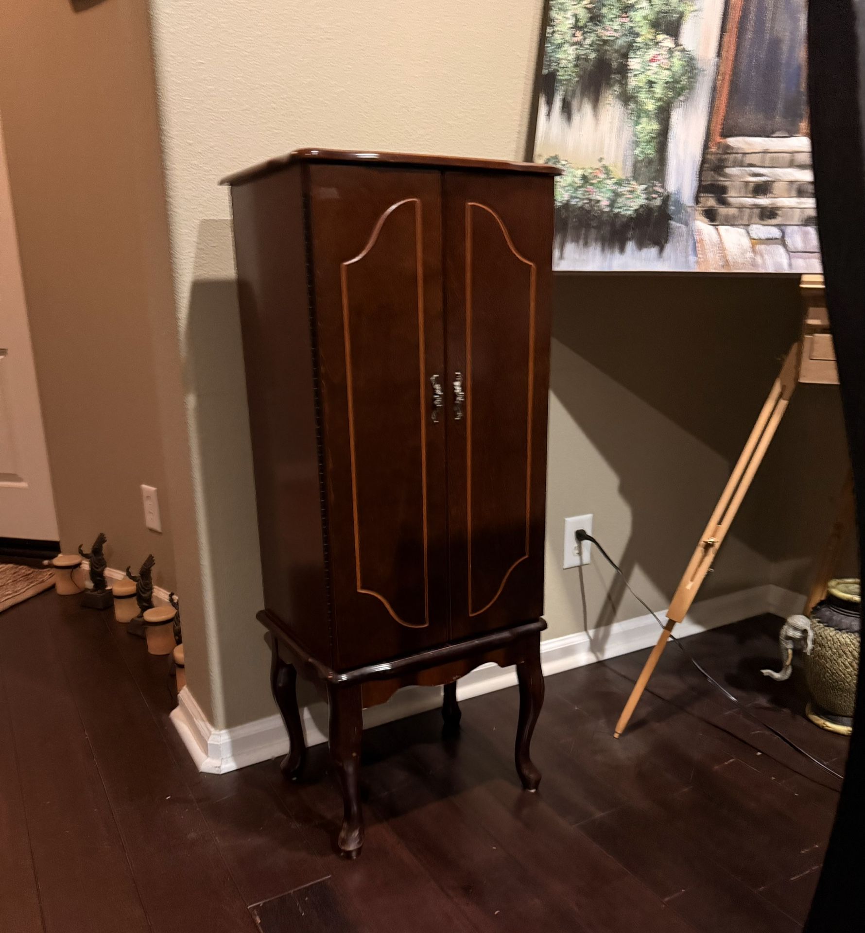 Antique jewelry cabinet