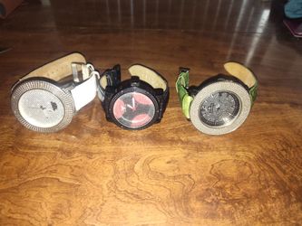 Diamond watches in rings in grills