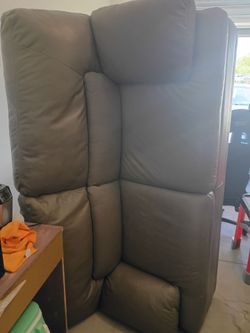 Leather love seat barely used