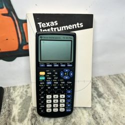 Texas Instruments TI-83 Plus Graphing Calculator With Book