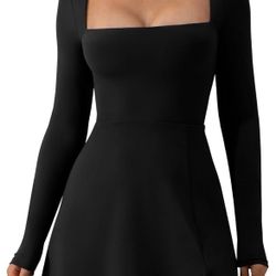 black long sleeve, side slit mini dress