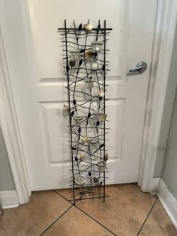 wall-mounted metal votive candle holder